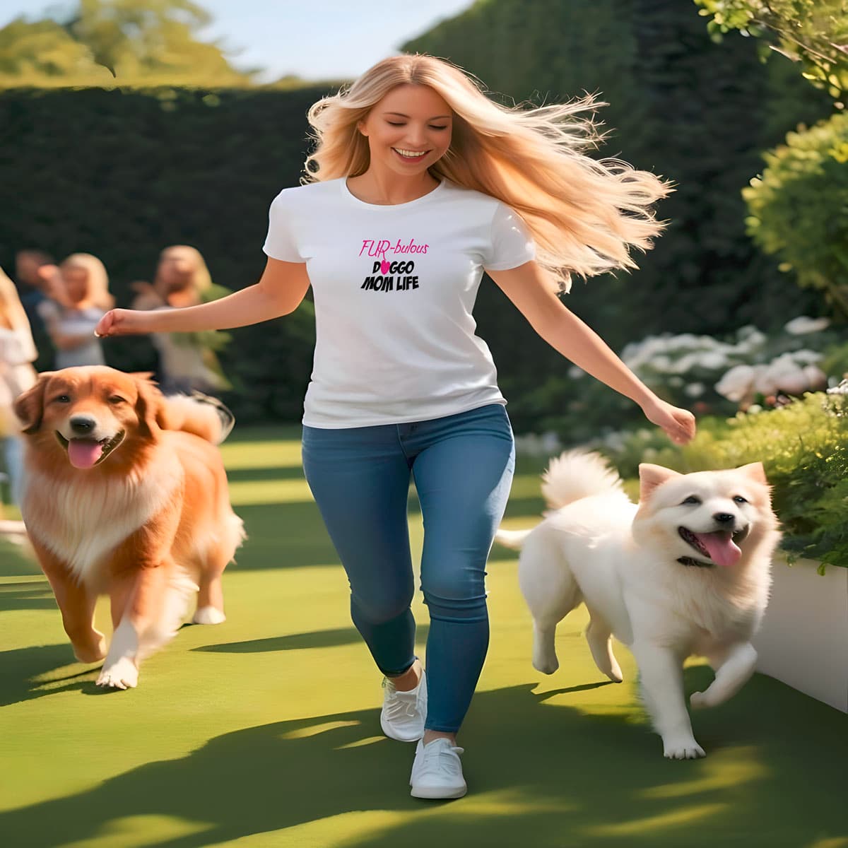 Women playing in a garden, with two dogs. She is wearing a white crew neck short sleeved t-shirt. Featuring a pink "Fur-bulous and Doggo Mom life with cute pink heart graphic style, fits true to sizes.