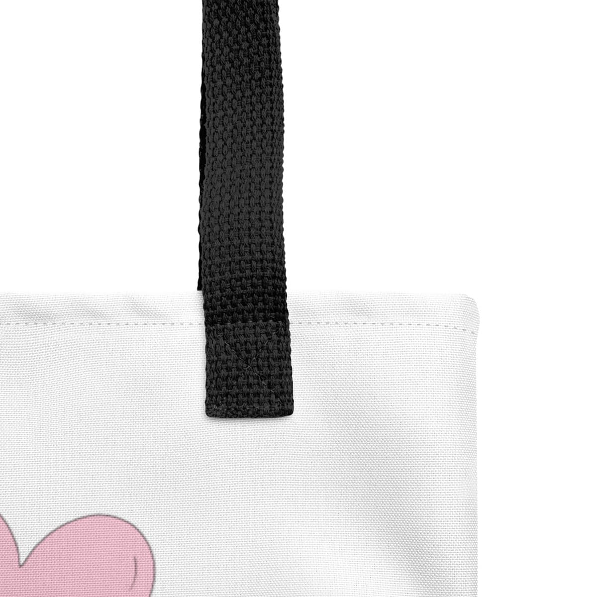 Close up of seams and stitch of a Uni-size 15"x15" white tote polyester canvas bag, with black stripped handle, featuring a charming graphic of two adorable dogs sitting together and holding onto pink balloons.