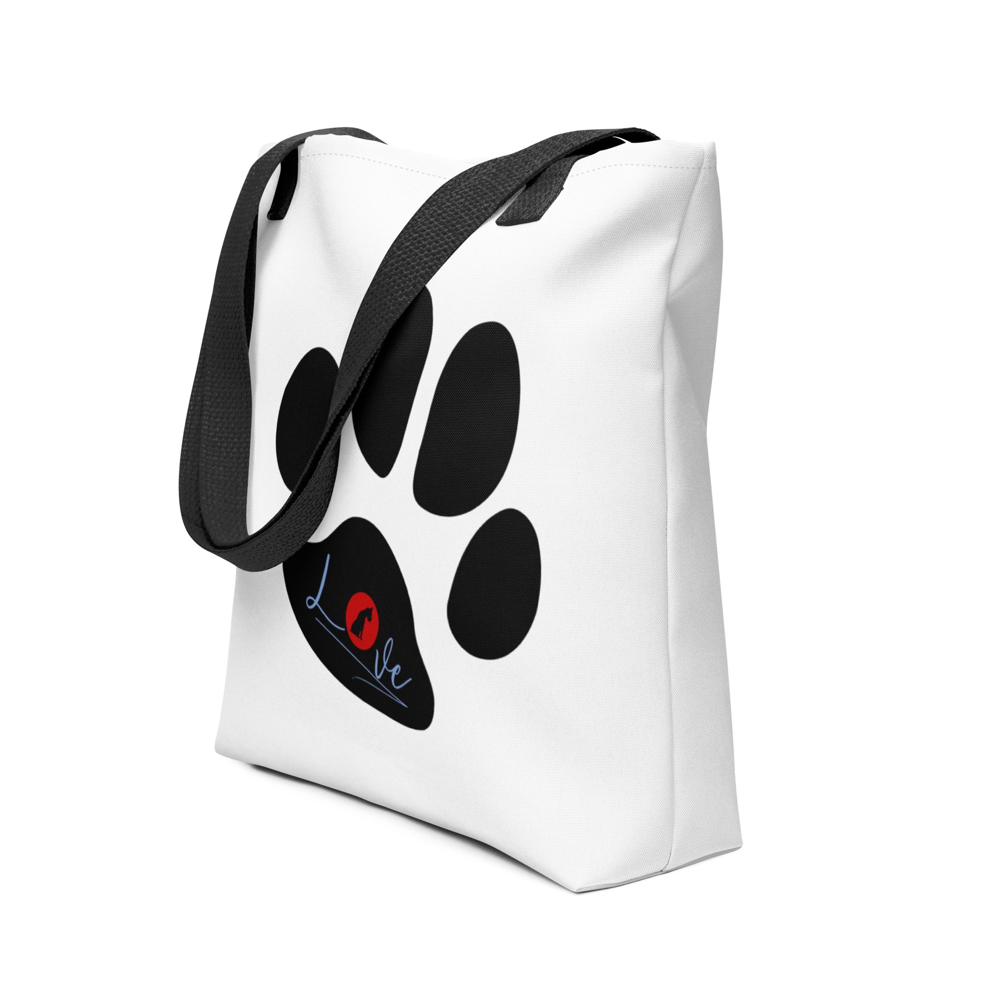 White spun canvas fabric tote bag, with black handle stripped, on the tote is cute graphic large paw, on top of the large paw is the text "love" the letter "o" in "love" is a red logo of a dog sitting