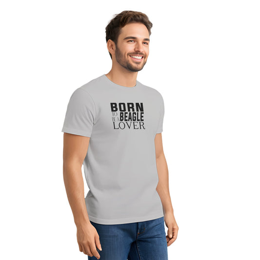 Male model wearing a gray Unisex cotton crew neck t-shirt featuring bold black and white graphic text 'Born to Be a Beagle Lover' printed across chest, perfect for dog lovers."