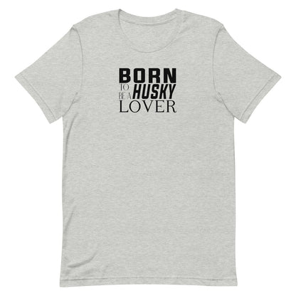 Gray short sleeved crew neck t-shirt with black “BORN TO BE A HUSKY LOVER” graphic text printed on the chest
