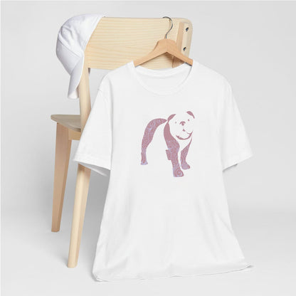 White crew neck short sleeved t-shirt, features a charming bulldog silhouette with floral, and swirl pattern design. Female model shown in close-up to highlight print and fit.

