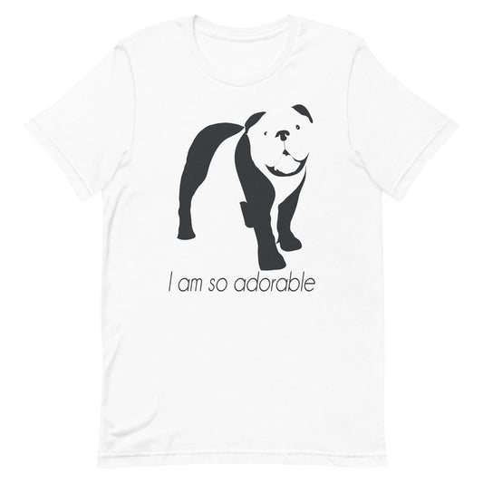 White crew neck short sleeved t-shirt, features a charming bulldog silhouette with playful quote; I am so adorable” across chest.