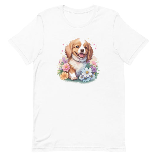 White crew neck short sleeved t-shirt, feature a graphic vibrant colorful hand-drawn dog face of a  Cavalier King Charles spaniel Puppy sitting in floral wreath