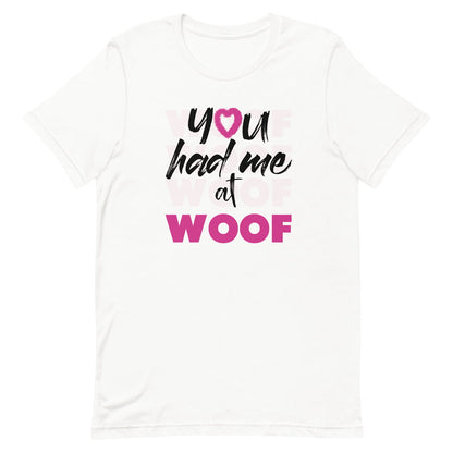 White crew neck short sleeved t-shirt, feature a graphic classic quote ”you had me at woof”  across chest. 
