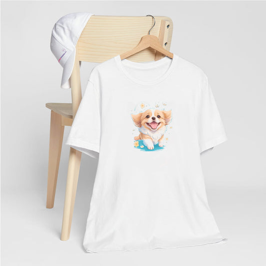 White crew neck short sleeved t-shirt, feature a graphic vibrant colorful hand-drawn happy Corgi puppy nestled amidst of flowers.T-shirt hanging on chair shown in close-up to highlight print and size.