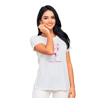 White crew neck short sleeved t-shirt, feature a cute happy corgi dog face, with a fun statement, quote with a twist ”Dogs are the 6th sense of humans”. Female model shown in close-up to highlight print and fit.
