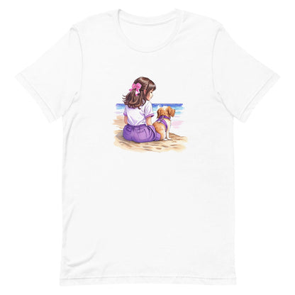 White crew neck short sleeved t-shirt, boasting a lively scene of a cute puppy and a girl basking on a beach vista.