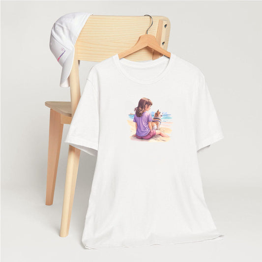 White crew neck short sleeved t-shirt, feature a lively puppy and girl duo splashed across your tee in vivid watercolor. T-shirt hanging on chair shown in close-up to highlight print and size