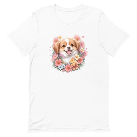 White crew neck short sleeved t-shirt, features an adorable Australian shepherd puppy, nestled amidst a fragrant floral bounty in a charming wicker basket.
