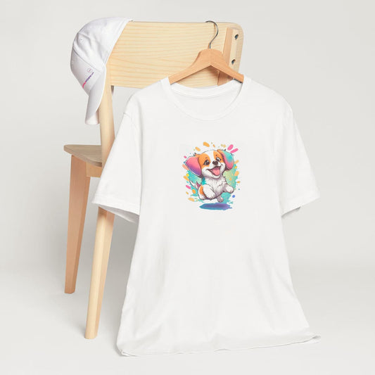 White crew neck short sleeved t-shirt, features a happy puppy in vibrant colors, bold and artistry. T-shirt hanging on chair shown in close-up to highlight print and size