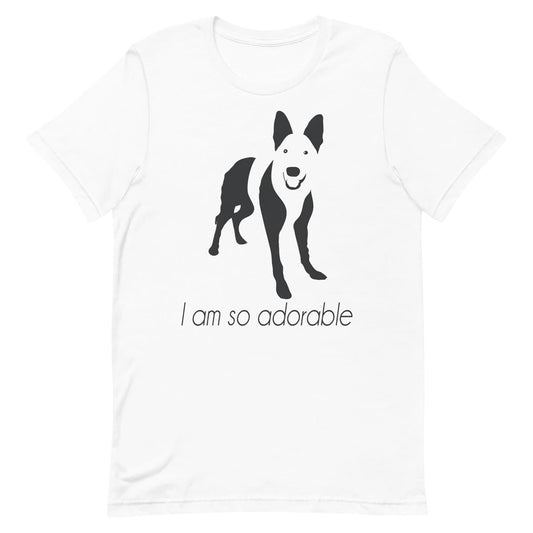 White crew neck short sleeved t-shirt, featuring a one-line graphic print of a hand-drawn German Shepherd with its tongue out, and the playful text "I am so adorable”