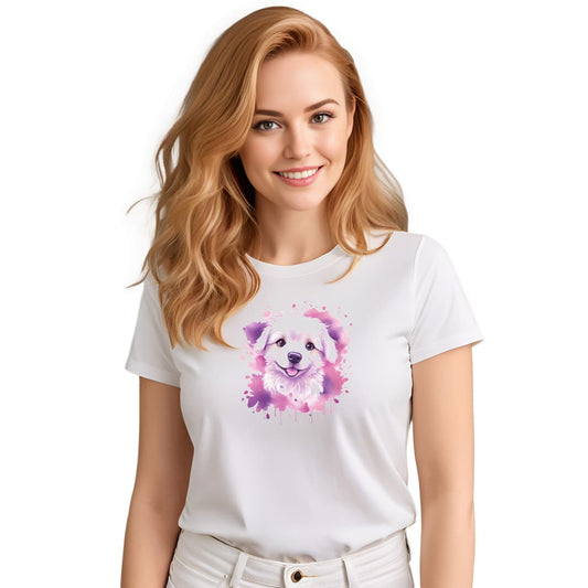 White crew neck short sleeved t-shirt. Featuring an enchanting Maltese puppy amidst a tapestry of splash artistry in vibrant pink and purple toned colors. Female model shown in close-up to highlight print and fit.