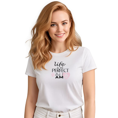 White crew neck short sleeved t-shirt, feature a fun statement, quote with a twist ”life is not perfect but I am”. Female model shown in close-up to highlight print and fit.
