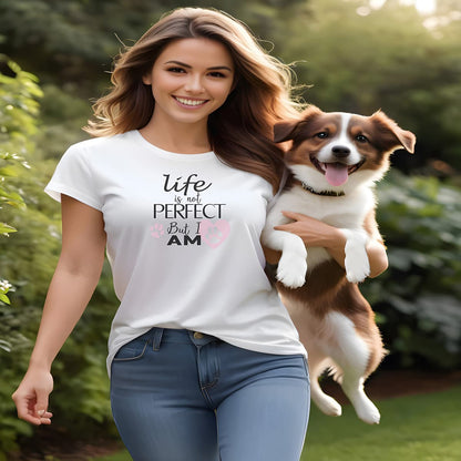 Women carry a dog, wearing a white crew neck short sleeved t-shirt, feature a fun statement, quote with a twist ”life is not perfect but I am”.