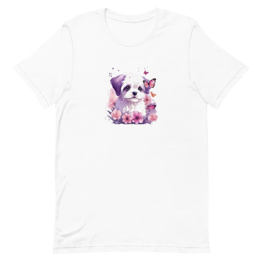 White crew neck short sleeved t-shirt, features a cute Maltese puppy face, nestle in floral colorful garden.