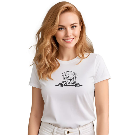 White crew neck short sleeved t-shirt. Featuring a playful one-line hand drawn black/white graphic of a dog face Bulldog puppy resting its paws on a table. Female model shown in close-up to highlight print and fit.
