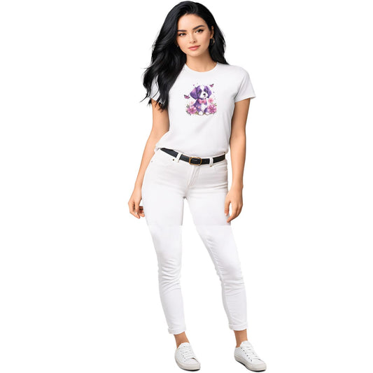 White crew neck short sleeved t-shirt, Showcases a cute puppy nestled amidst a wicker-basket bouquet, surrounded by blossoms and butterflies. Female model shown in close-up to highlight print and fit.