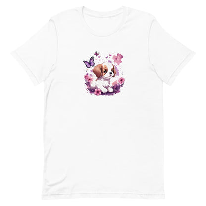 White crew neck short sleeved t-shirt, feature an irresistible, adorable puppy lounging amidst a flourishing tapestry of blossoms and butterflies, in a rustic wicker basket.