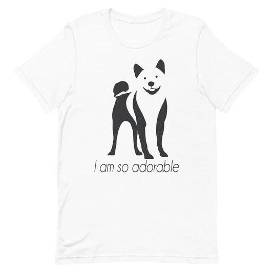 White crew neck short sleeved t-shirt, featuring a hand-drawn black and white one-line graphic print silhouette of an adorable Shiba Inu with its tongue out. The text "I am so adorable" underneath the dog .