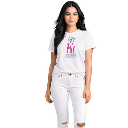 White crew neck short sleeved t-shirt. Feature a cute Shiba Inu pink and purple silhouette with a fun message "life is more fun with a Shiba”. Female model shown in close-up to highlight print and fit.