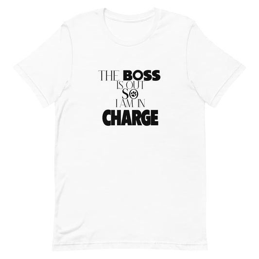 White crew neck short sleeved t-shirt, features a playful message "the boss is out so i am in charge" in bold black graphic style, underlined by a dog paw.