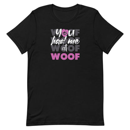 Black crew neck short sleeved t-shirt flat lay, feature a graphic classic quote ”you had me at woof”  a cross chest. 