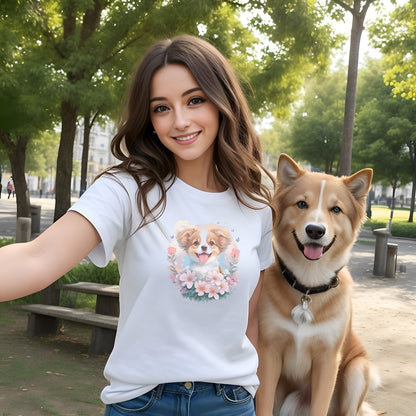 White crew neck short sleeved t-shirt, feature a graphic vibrant colorful hand-drawn dog face of a  Shepherd Puppy sitting in floral wreath. woman outdoor dog
