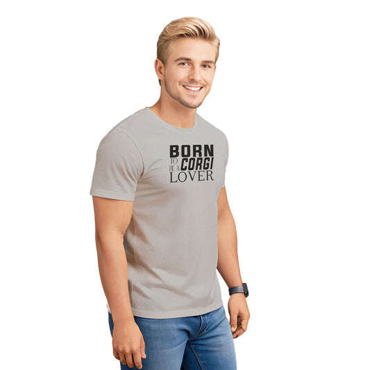 Gray t-shirt with black “BORN TO BE A CORGI LOVER” graphic text printed on the chest. Crew neck style shown close-up on a male model. Pet-themed fashion for Corgi fans and dog lovers. 