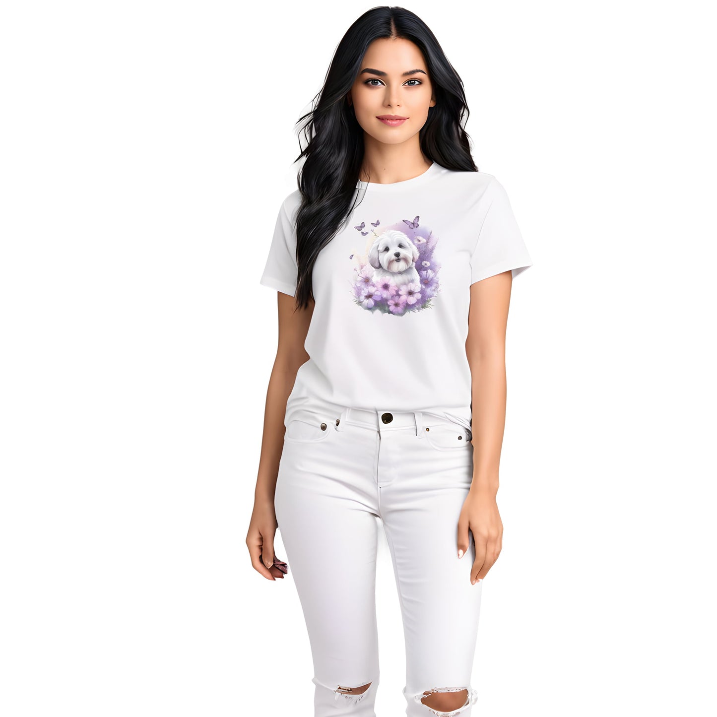 White crew neck short sleeve t-shirt with a colorful hand-drawn Coton de tulear puppy graphic sitting in a floral garden. Woman models the shirt, close up showing bold dog art, cute pet-themed fashion