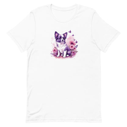 
White crew neck short sleeved t-shirt, features an adorable, lively puppy amidst a vibrant wicker basket brimming with floral splendor and playful butterflies.