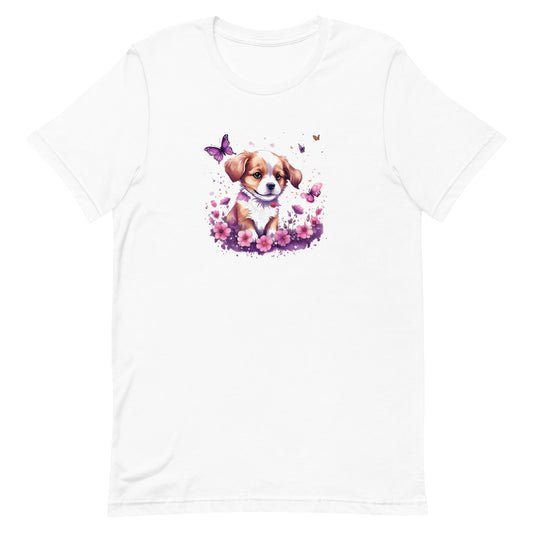 White crew neck short sleeved t-shirt, Showcases a vibrant Spaniel puppy, nestled amidst a floral wonderland within a quaint wicker basket, bursting with purples and pinks.