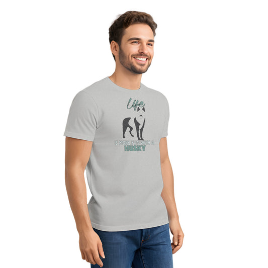 gray unisex short sleeved cotton t-shirt worn by male model, showing siberian husky silhouette and “Life is more fun with a husky” quote printed across the chest.