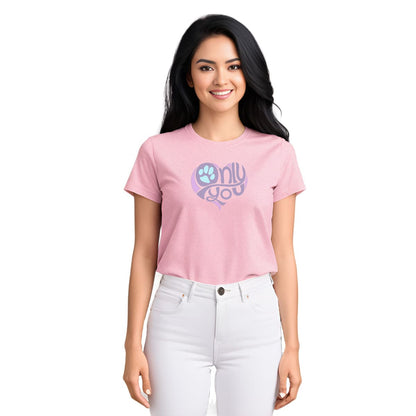 Closeup of a Female model wearing a unisex short sleeve crew neck t-shirt in white or pink, featuring a bold ‘Only You’ text with a purple graphic, pink heart, and turquoise paw print. Soft cotton, cozy fit, stylish apparel for dog moms, pet lovers, and everyday casual wear.