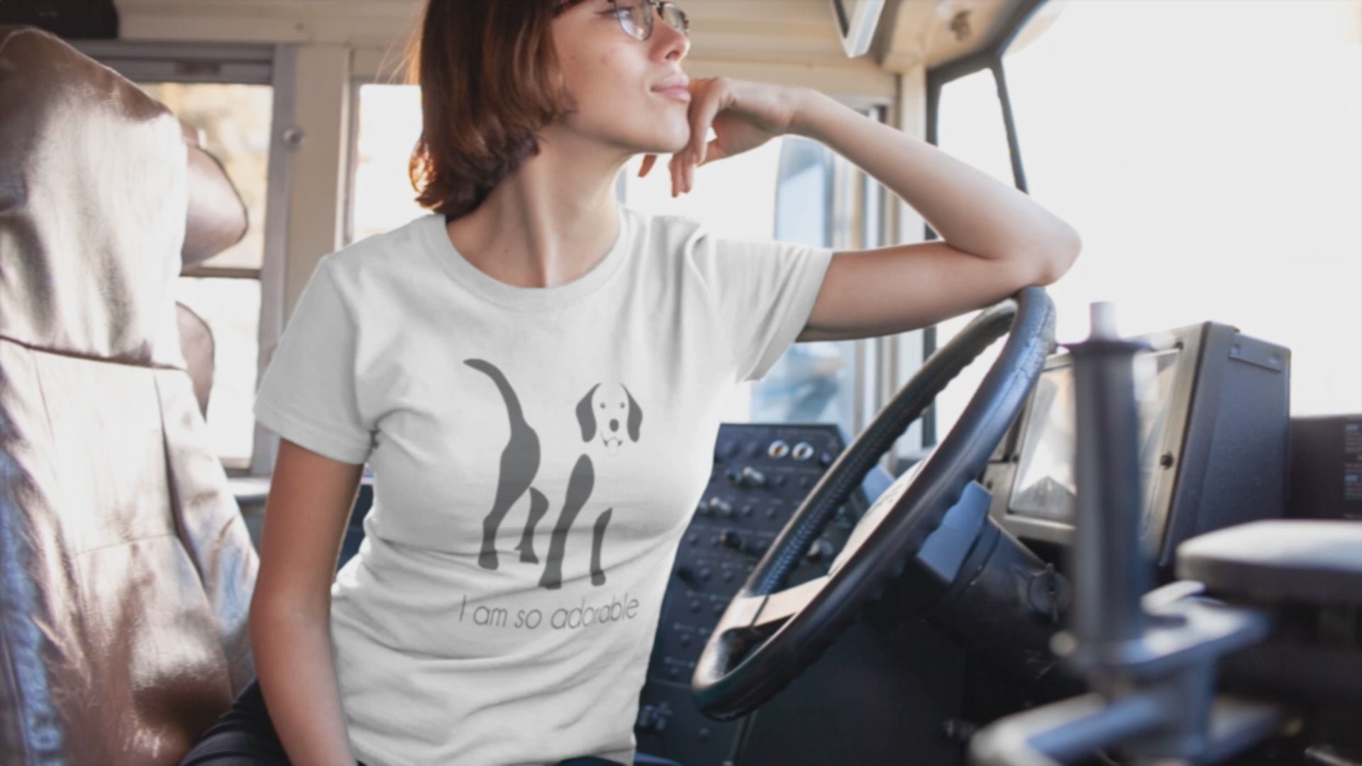 video of truck drivr women waering a crew neck white t-shirt with a Beagle dog black and white print