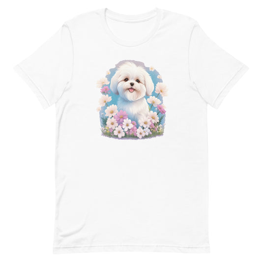 White cotton crew neck unisex short sleeve tshirt, on the apparel is a detailed kawaii illustration print of a lively cute adorable coton de tulear surrounded by floral arrangement in a wicker basket. The design brings a touch of color, warmth, and charm in pastel color palette to the shirt print.