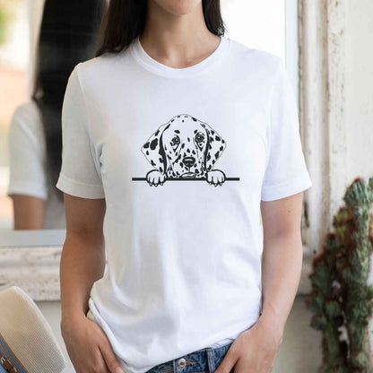 White cotton crew neck unisex  short sleeve tshirt, on the apparel is a black/white one-line  graphic of a cute dalmatian dog face,  putting it´s paws on the table