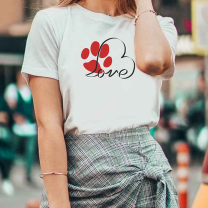 White cotton crew neck unisex  short sleeve tshirt, on the apparel is a graphic one line shaped as a heart turning into the letter love with tilted letters, beside is a red paws.