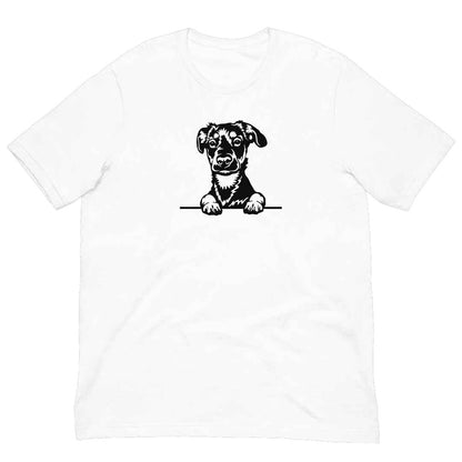 White cotton crew neck unisex  short sleeve tshirt, on the apparel is a black/white one-line  graphic of a cute Rottweiler puppy dog face,  putting it´s paws on the table.