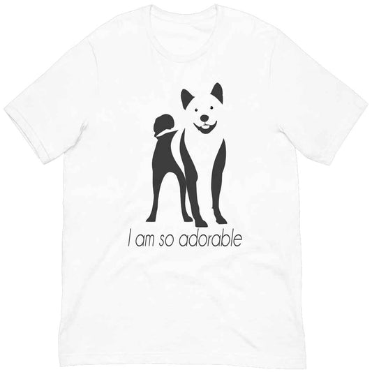 White cotton crew neck unisex  short sleeve tshirt, on the apparel is a black one-line graphic print silhouette of a cute shiba-Inu dog standing with its tongue out. underneath the dog is the text " i am so adorable" in cap" 