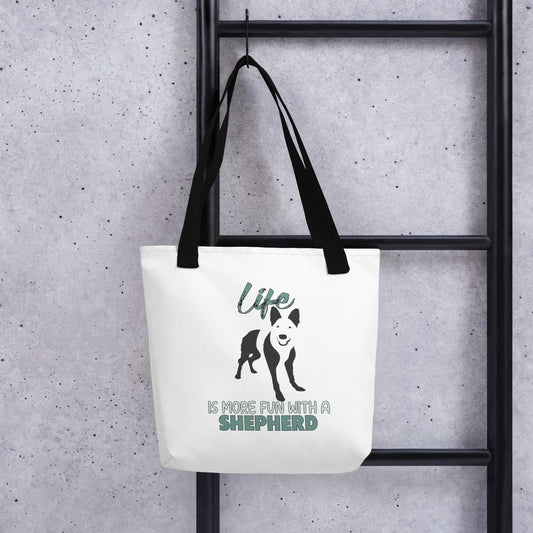 Uni-size 15"x15" white tote polyester canvas bag, with black stripped handle, feature a black one-line German Shepherd puppy print with life quote ”life is more fun with a Shepherd”. Printed front and back.