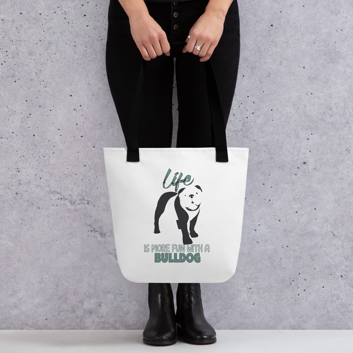 Uni-size 15"x15" white tote polyester canvas bag, with black stripped handle, feature a black one-line Bulldog print with life quote ”life is more fun with a Bulldog”. Printed front and back.