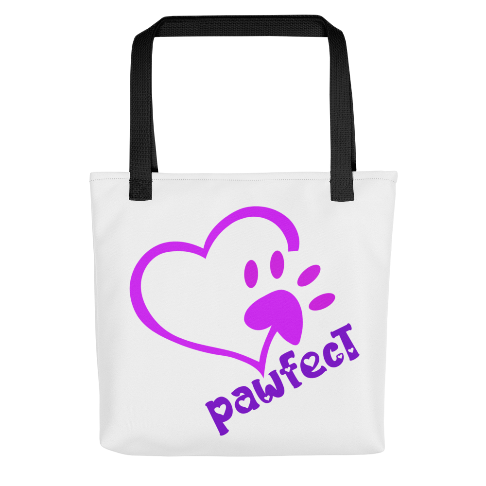 White spun canvas fabric tote bag, with black handle stripped, on the tote is  cute graphic pink shaped heart with a paw on the side, underneath the heart is the tilted text "pawfect"  in color purple