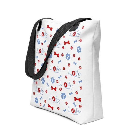 White spun canvas fabric tote bag, with black handle stripped, on the tote is  cute graphic dog bones, paws and the text "love" with a dog sitting as a logo