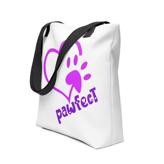 White spun canvas fabric tote bag, with black handle stripped, on the tote is  cute graphic pink shaped heart with a paw on the side, underneath the heart is the tilted text "pawfect"  in color purple