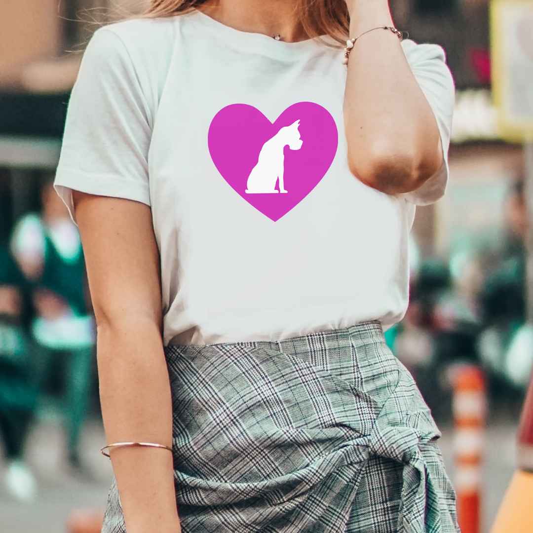 White cotton crew neck unisex  short sleeve tshirt, on the apparel is a graphic pink heart, in the middle of the heart a dog in white graphic background.