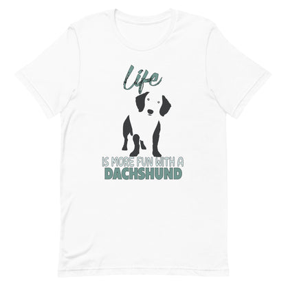 White cotton crew neck unisex  short sleeve tshirt, on the apparel is a black one-line graphic print silhouette of a cute Dachshund standing with its tongue out. Above the dog is the text " LIFE" in cap and underneath the dog is the text " is more fun with a Dachshund" in cap