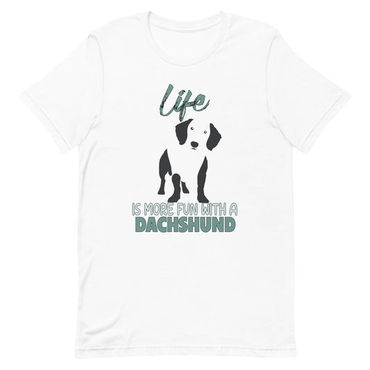 White cotton crew neck unisex  short sleeve tshirt, on the apparel is a black one-line graphic print silhouette of a cute Dachshund standing with its tongue out. Above the dog is the text " LIFE" in cap and underneath the dog is the text " is more fun with a Dachshund" in cap