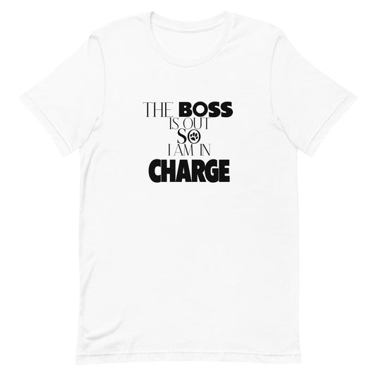 White cotton crew neck unisex  short sleeve tshirt, on the apparel is a graphic black/white text  saying "The boss is out so i am in charge"  in cap, the  letter O in "so" is a black paw logo