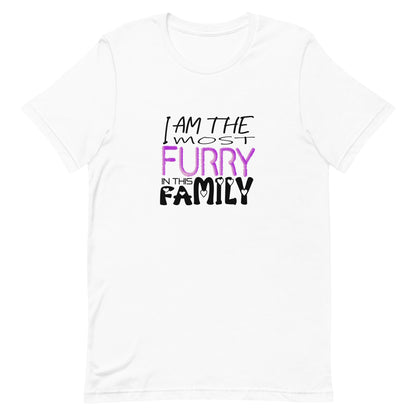 White cotton crew neck unisex  short sleeve tshirt, on the apparel is a graphic text saying " i am the most furry in this family" the text "furry" is with fluffy pink graphic. and the text "family" got small hearts in each of the letters.